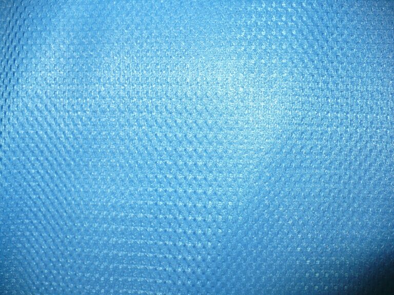 Close-up of textured blue fabric surface