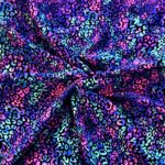 Colorful leopard print fabric with vibrant hues.
