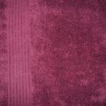 Maroon textured fabric with vertical stripes.