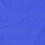 Solid blue fabric with visible creases.