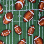 Football pattern on green field background.