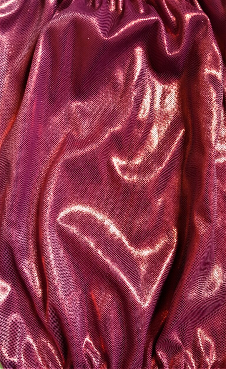 Shiny pink fabric with gathered texture