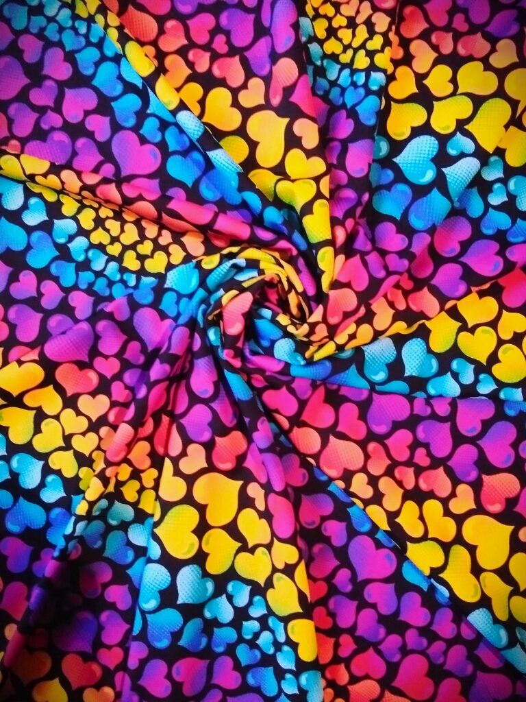 Colorful heart-patterned fabric, swirling design