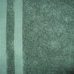 Gray textured fabric with vertical stripes.