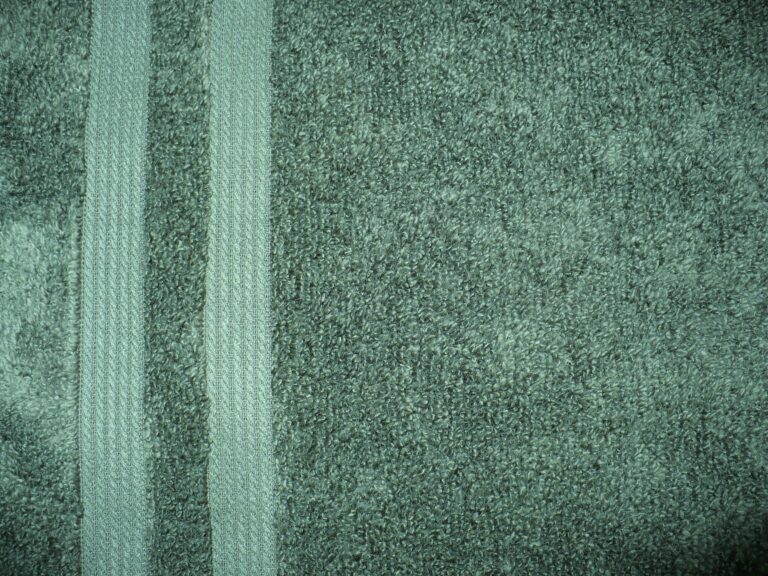 Gray textured fabric with vertical stripes