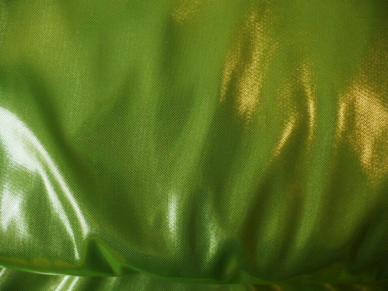 Shiny green fabric with textured surface