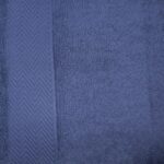 Dark blue textured towel with pattern stripe.