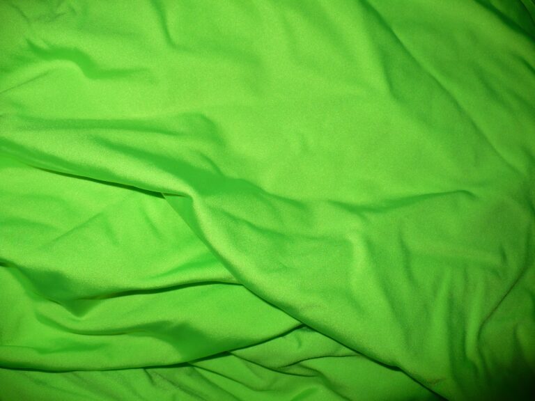 Bright green fabric with soft folds