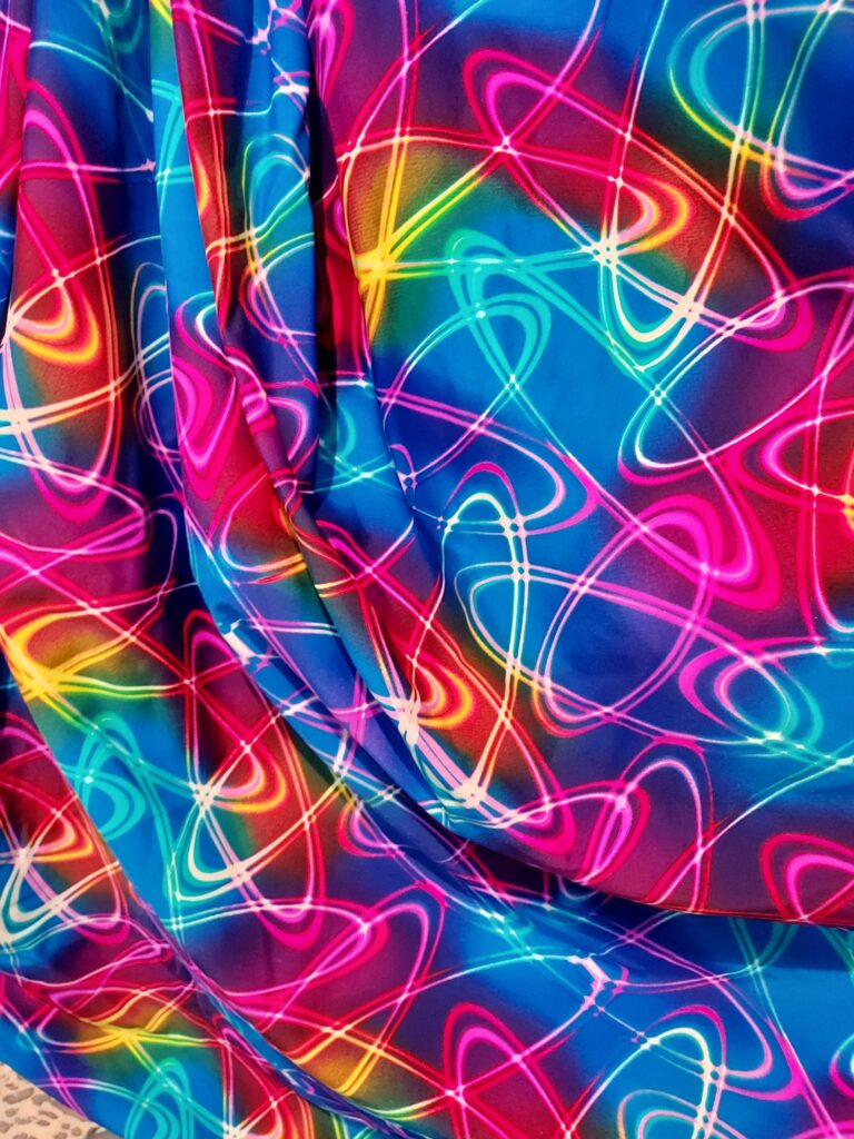 Colorful neon swirl pattern on fabric