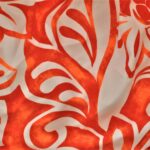 Orange and white floral pattern fabric.