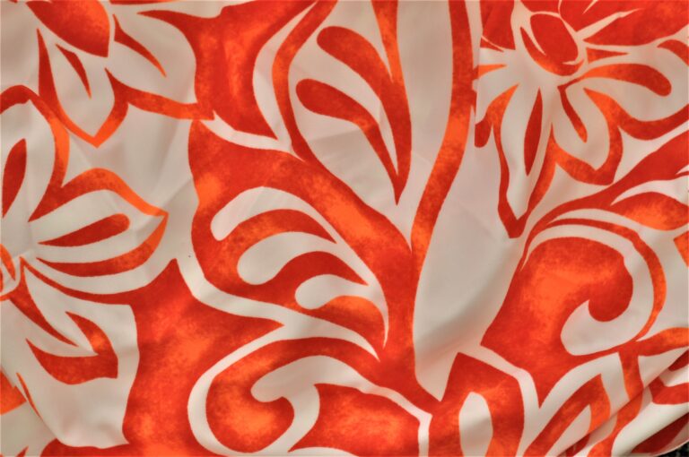 Orange and white floral pattern fabric