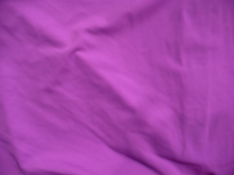 Purple fabric with soft folds and creases
