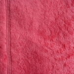 Close-up of a red textured fabric.