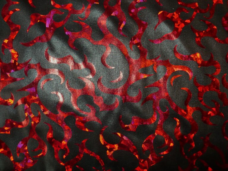 Red and black abstract patterned fabric