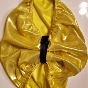 Shiny yellow fabric with black strap.