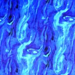 Abstract blue and purple marbled pattern.