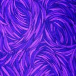 Purple abstract pattern with swirling lines.