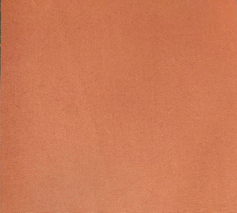 Orange textured fabric with subtle pattern