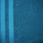 Blue textured towel with two vertical stripes.