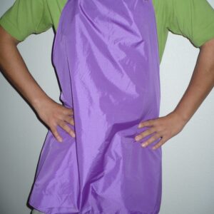 Person wearing a purple apron and shirt.